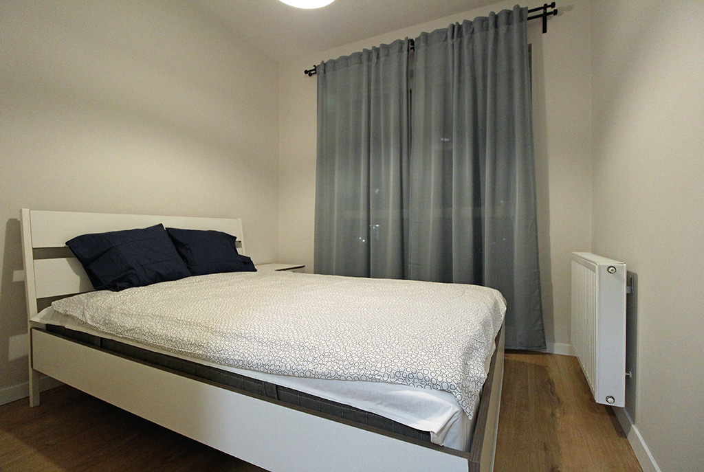 prywatna, elegancka sypialnia w luksusowym apartamencie na wynajem Kraków