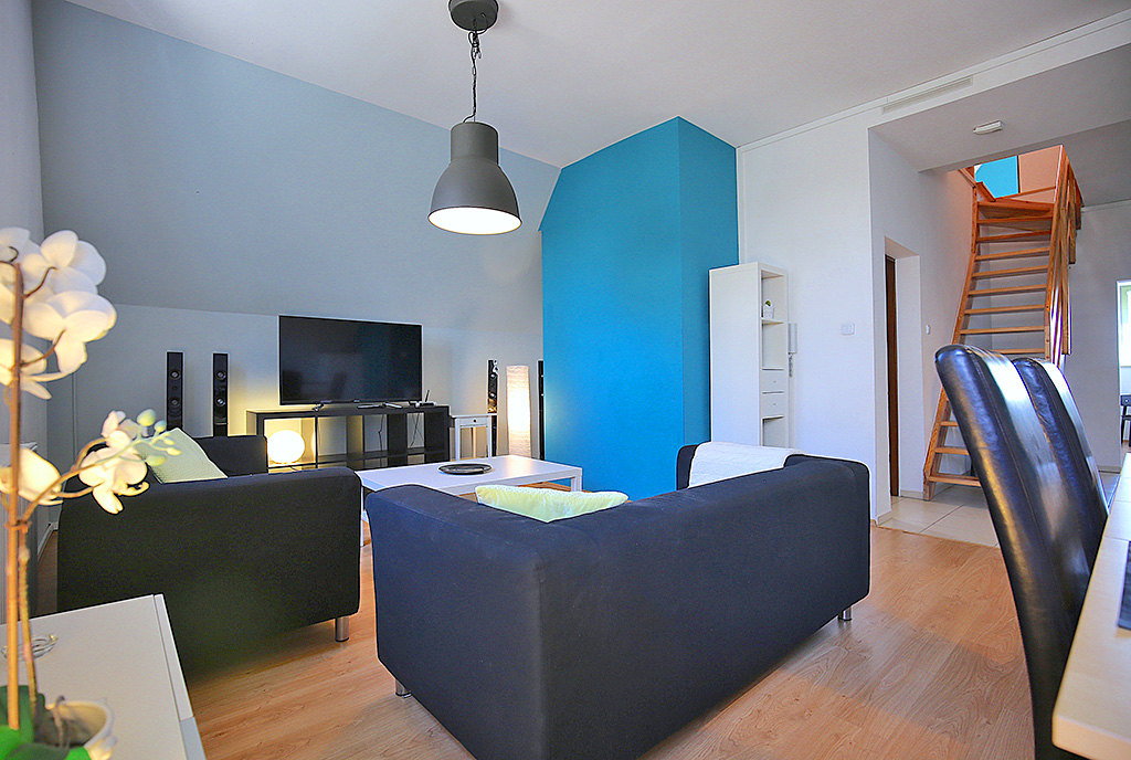 nowoczesny salon w ekskluzywnym apartamencie do wynajęcia Szczecin