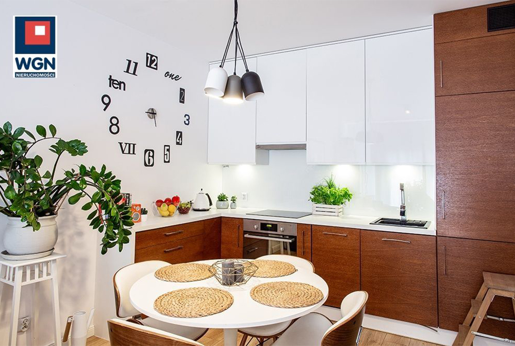widok na jadalnię i aneks kuchenny w luksusowym apartamencie do sprzedaży Gdańsk