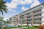widok od strony baseny na ekskluzywny apartamentowiec, w którym znajduje się oferowany na sprzedaż luksusowy apartament Hiszpania (Guardamar De Segur)