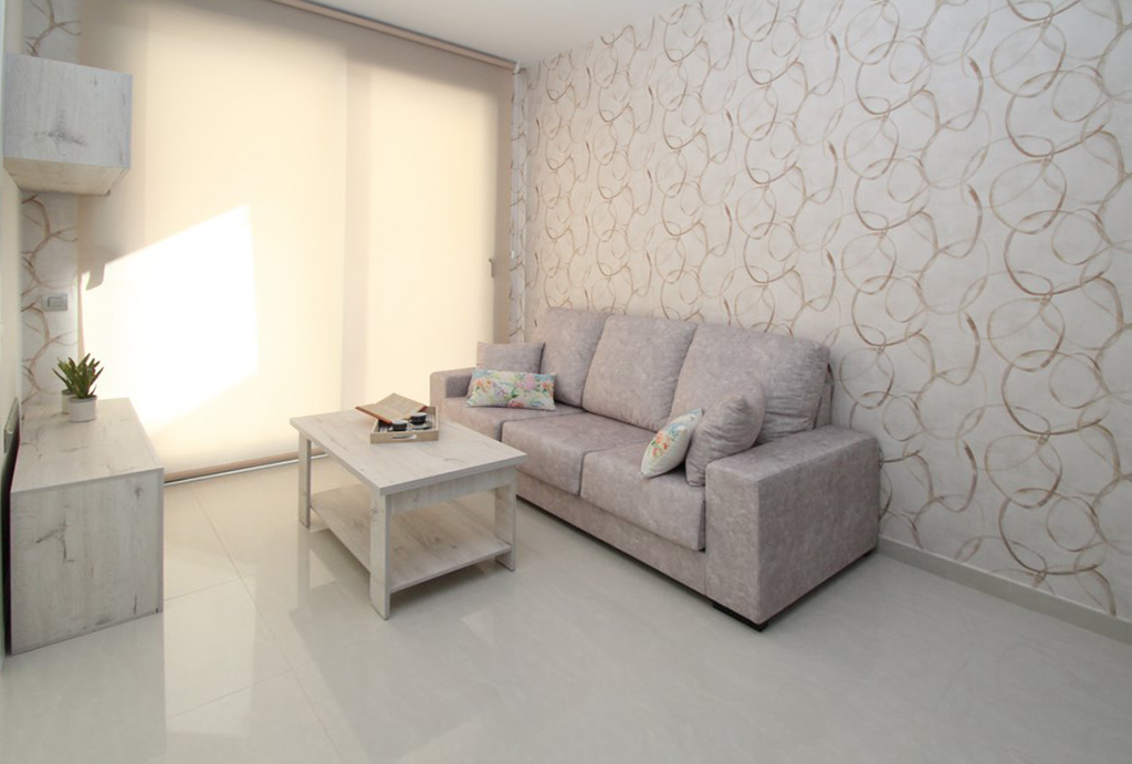 fragment kameralnego salonu w luksusowym apartamencie na sprzedaż Torreviej (Hiszpania)