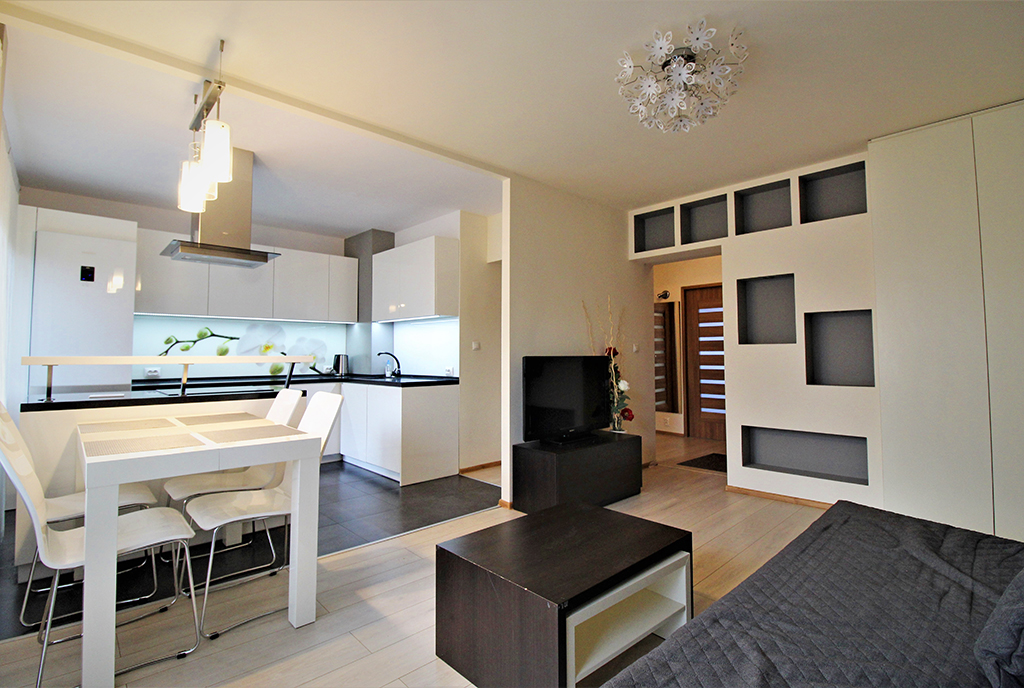 zaprojektowane w nowoczesnym designie wnętrze ekskluzywnego apartamentu do wynajęcia Kraków
