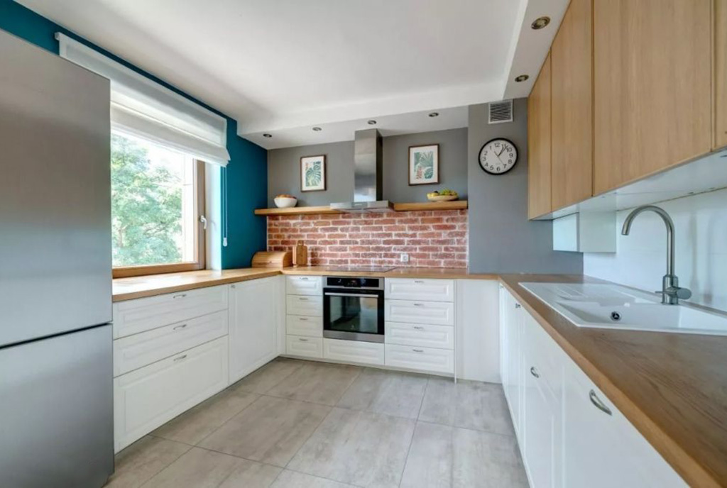 zabudowana funkcjonalnie kuchnia w luksusowym apartamencie na sprzedaż Gdynia