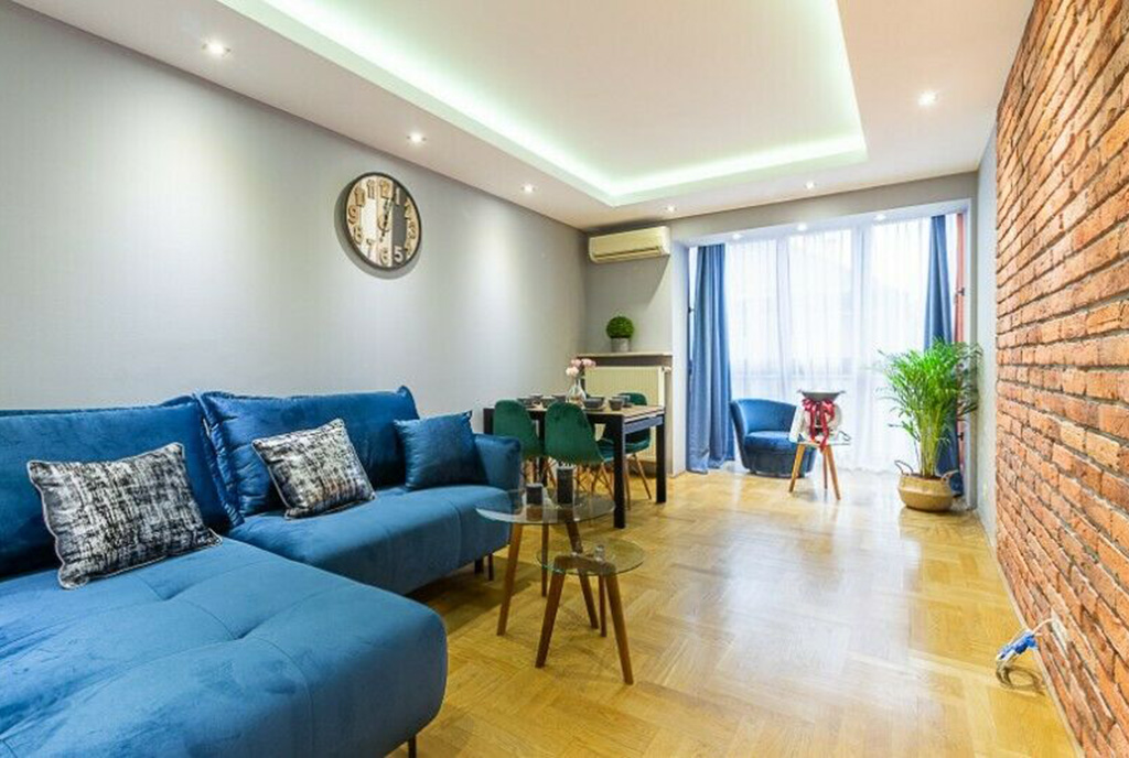efektowne oświetlenie w ekskluzywnym salonie luksusowego apartamentu do sprzedaży Kraków
