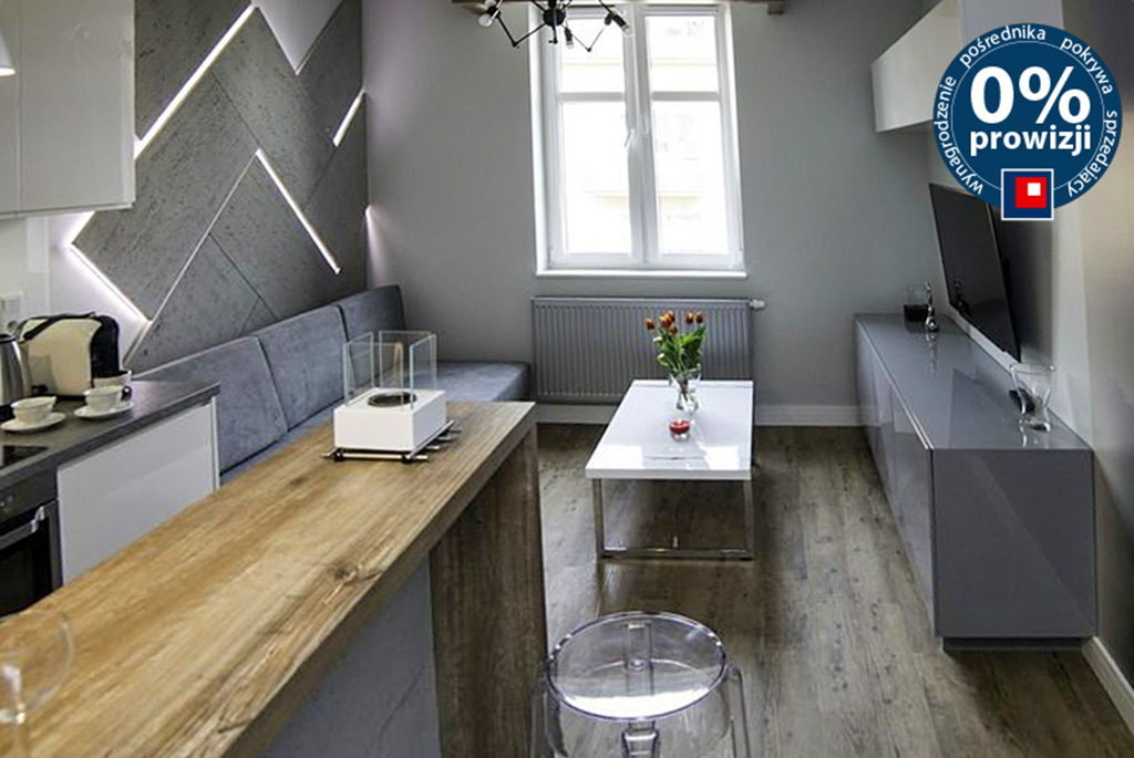 widok na jadalnię i aneks kuchenny w ekskluzywnym apartamencie do sprzedaży Kraków