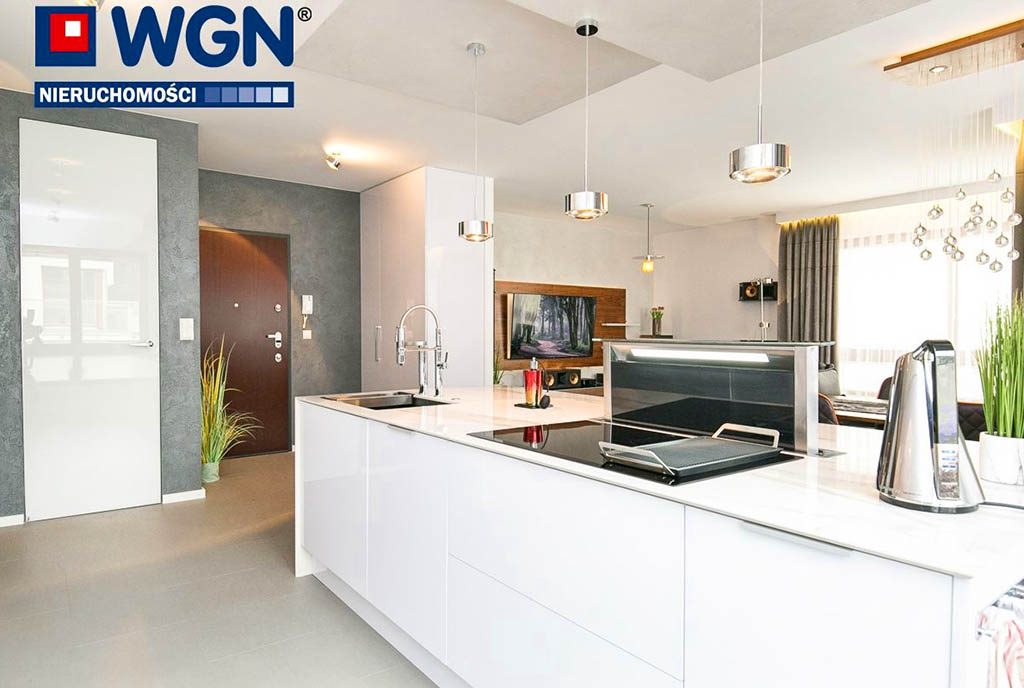 widok na nowoczesną kuchnię w luksusowym apartamencie na sprzedaż Gdynia