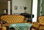 wytworny salon z fortepianem w ekskluzywnej willi do sprzedaży Piotrków Trybunalski