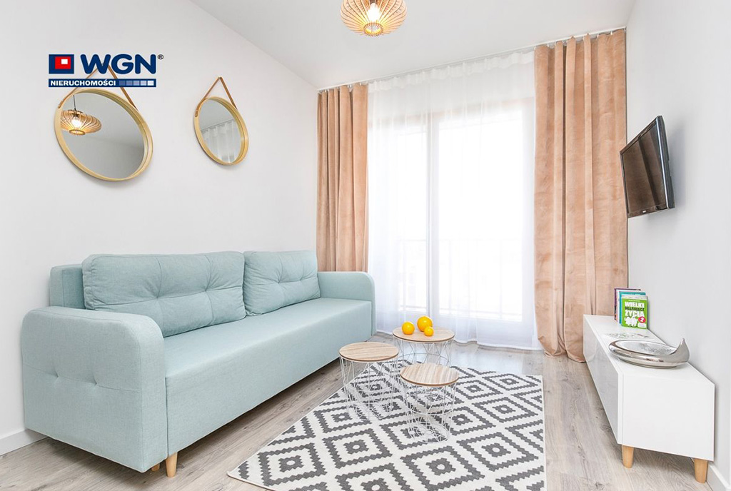 widok z innej perspektywy na salon w luksusowym apartamencie do wynajmu Gdańsk