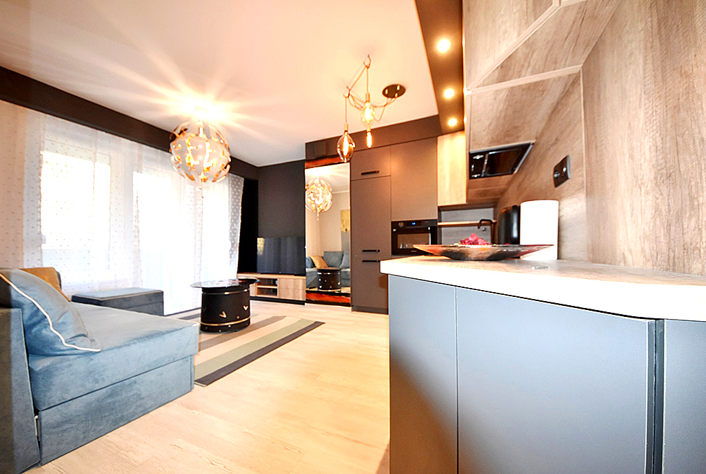 zaprojektowane w nowoczesnym stylu wnętrze luksusowego apartamentu do wynajmu Inowrocław