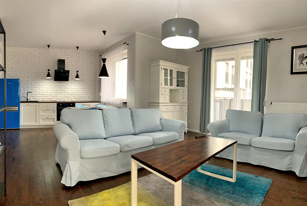 zbliżenie z innej perspektywy na salon w luksusowym apartamencie do wynajmu Konin