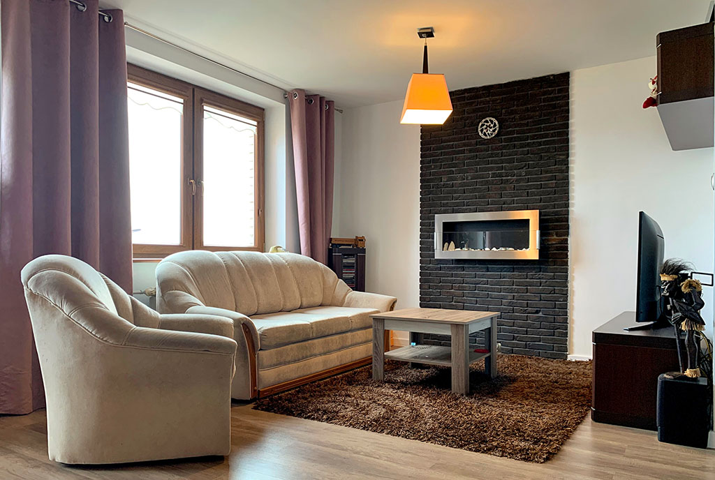 wytworny salon w ekskluzywnym apartamencie do sprzedaży Konin