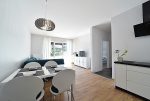 utrzymane w jasnych kolorach wnętrze ekskluzywnego apartamentu do wynajęcia Bolesławiec