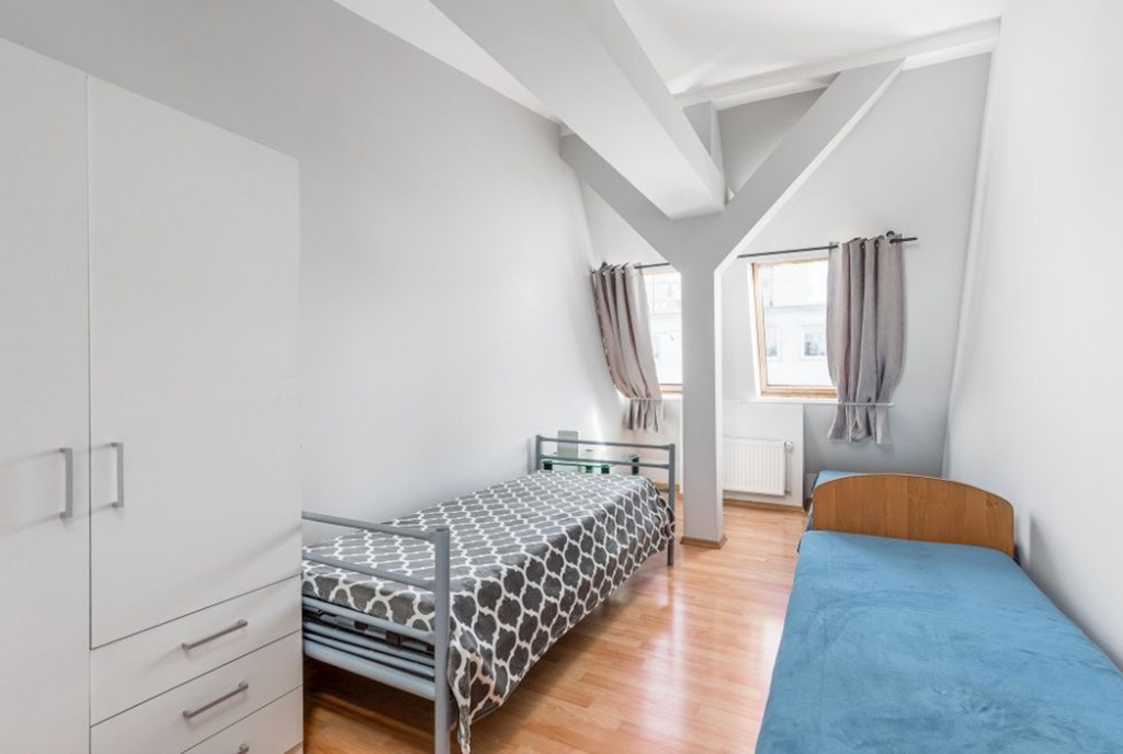 elegancka sypialnia w ekskluzywnym apartamencie na wynajem Szczecin