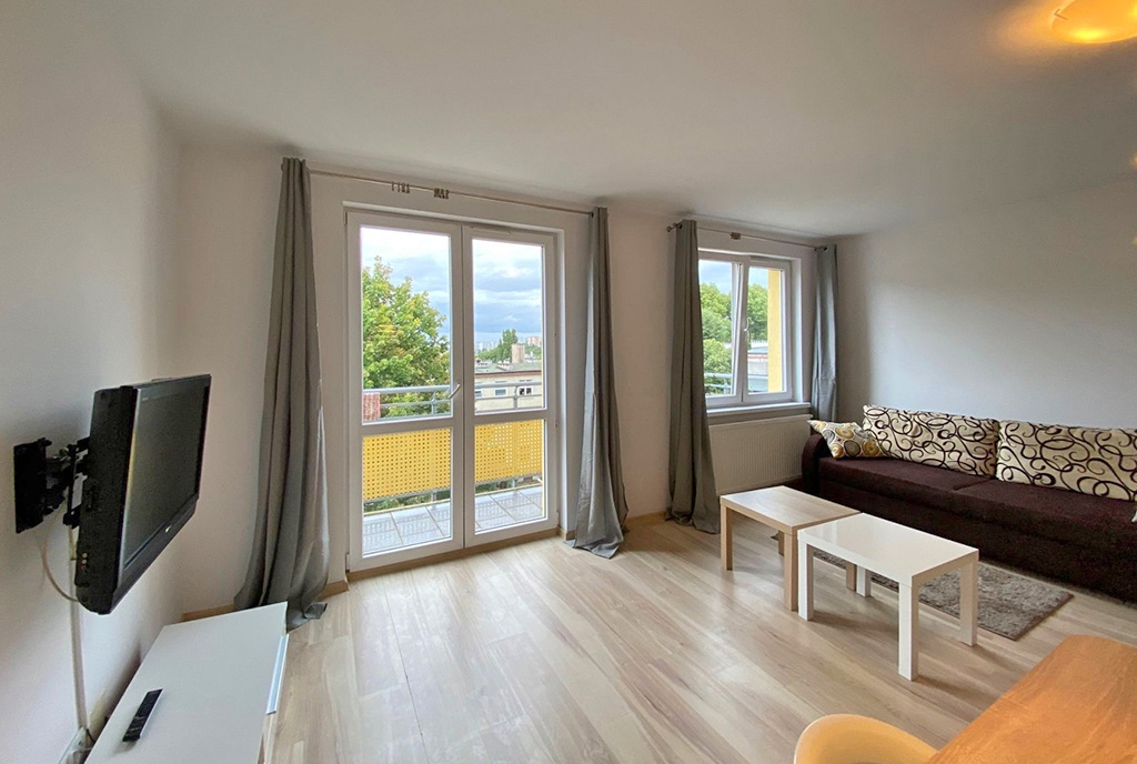 druga strona salonu w luksusowym apartamencie do wynajmu Szczecin