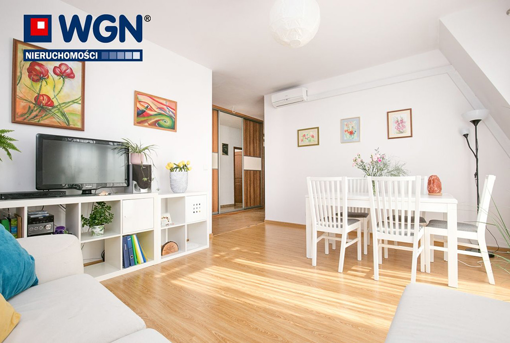 widok na jadalnię oraz aneks kuchenny w luksusowym apartamencie na sprzedaż Gdańsk
