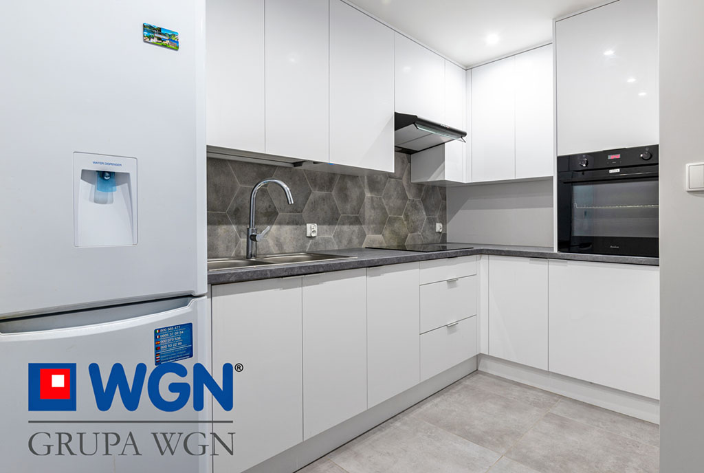 kuchnia w nowoczesnej zabudowie w ekskluzywnym apartamencie na sprzedaż Elbląg