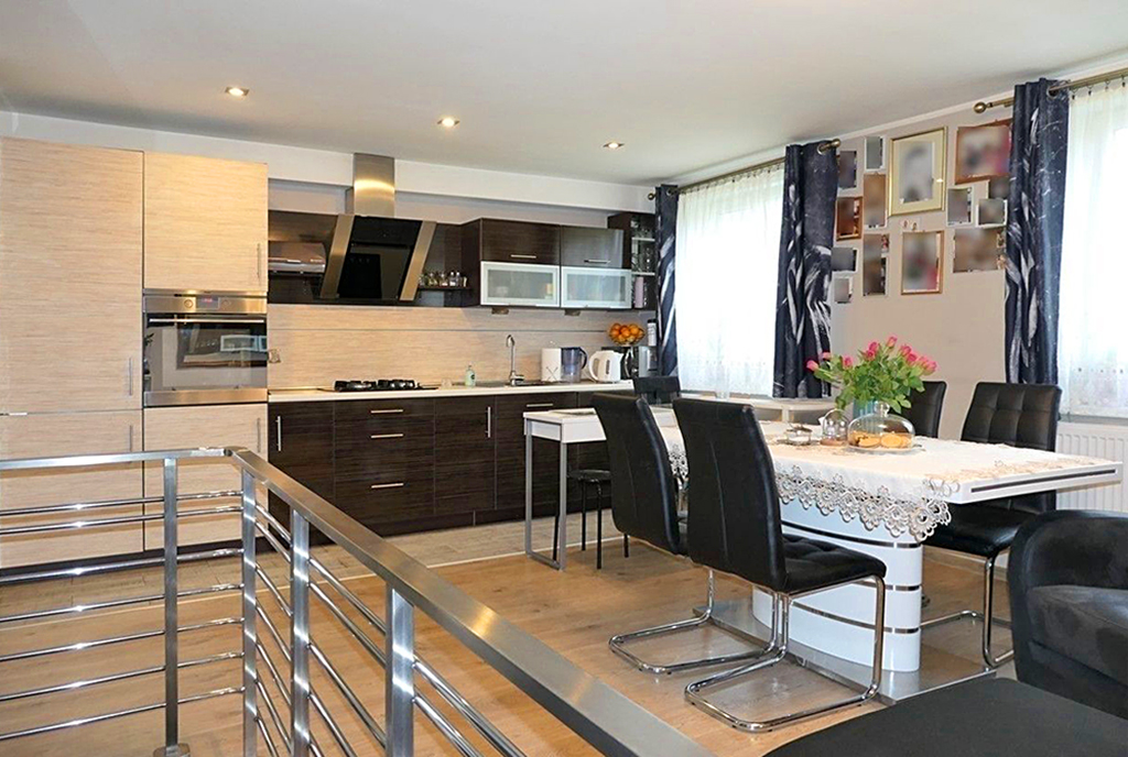 jadalnia i aneks kuchenny w ekskluzywnym apartamencie na sprzedaz Kwidzyn