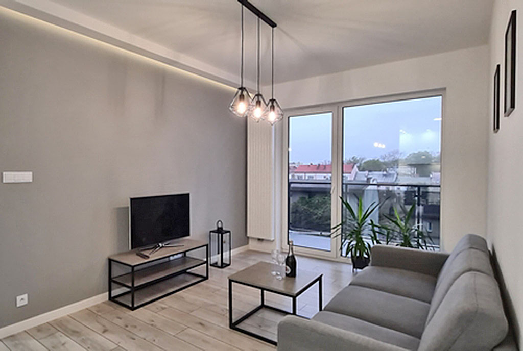 druga strona salonu w luksusowym apartamencie do wynajmu Wieluń