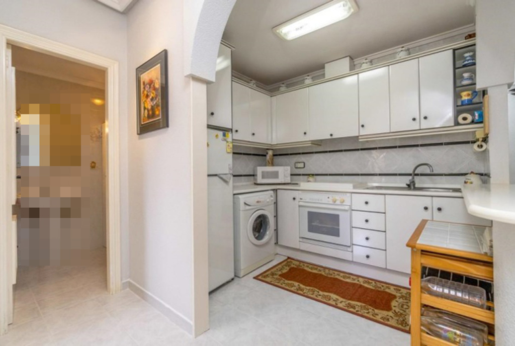 komfortowo zabudowana kuchnia w ekskluzywnej willi na sprzedaż Hiszpania (Costa Blanca, Orihuela Costa)