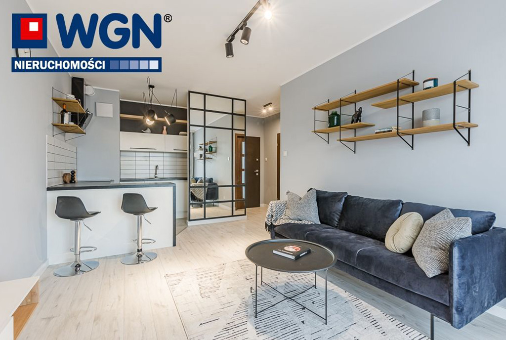 widok na salon oraz aneks kuchenny w ekskluzywnym apartamencie do sprzedaży Gdańsk