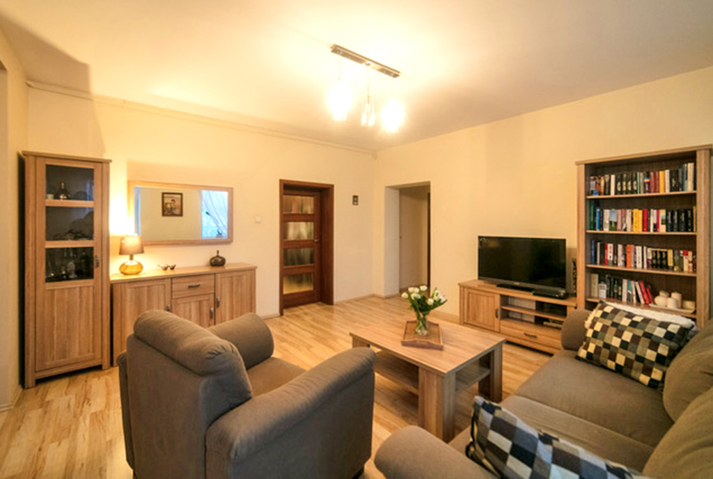 widok na pokój dzienny w luksusowym apartamencie do sprzedaży Szczecin