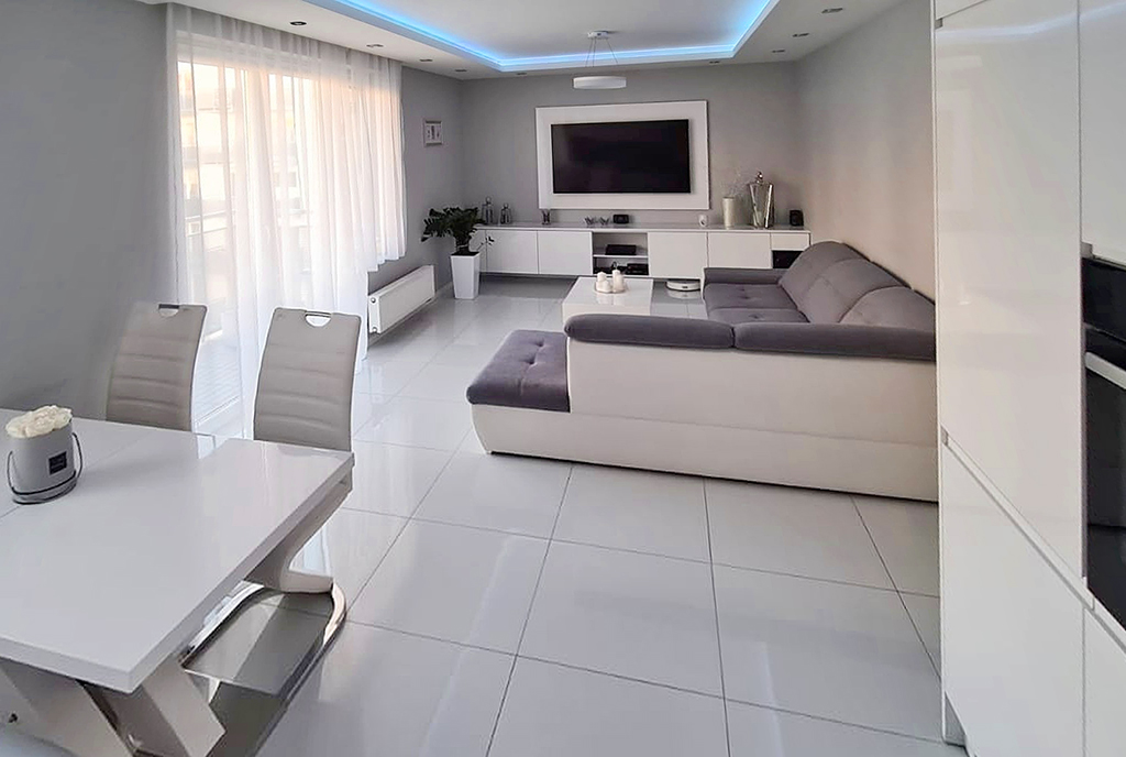 efektowne oświetlenie salonu w luksusowym apartamencie do sprzedaży Szczecin