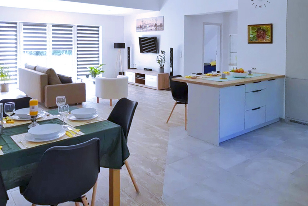 widok na pokój dzienny w ekskluzywnym apartamencie na wynajem Szczecin