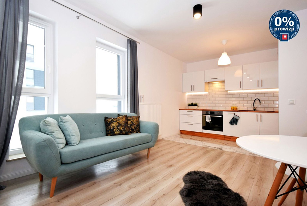 widok z salonu na aneks kuchenny w luksusowym apartamencie na sprzedaż Lublin