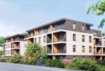 widok na apartamentowiec, w którym znajduje się oferowany na sprzedaż ekskluzywny apartament Mazury
