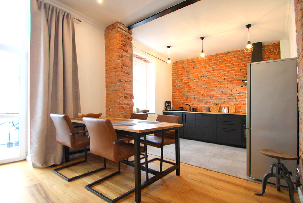 zaprojektowane w stylu loftu wnętrze ekskluzywnego apartamentu do wynajęcia Sieradz