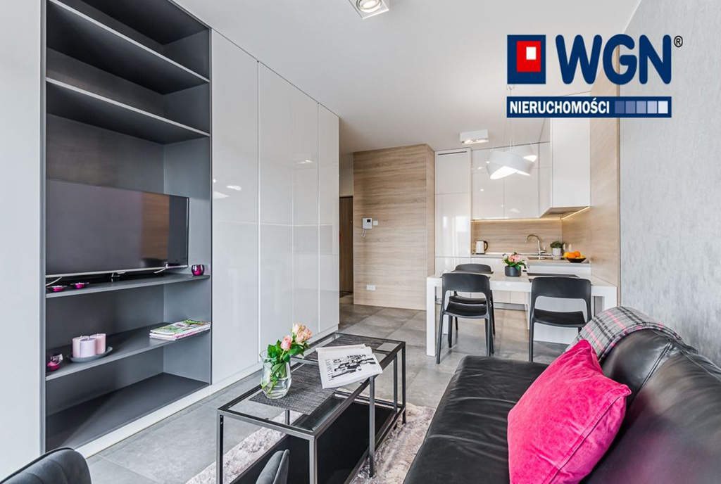 widok z salonu na aneks kuchenny w luksusowym apartamencie do wynajmu Gdańsk