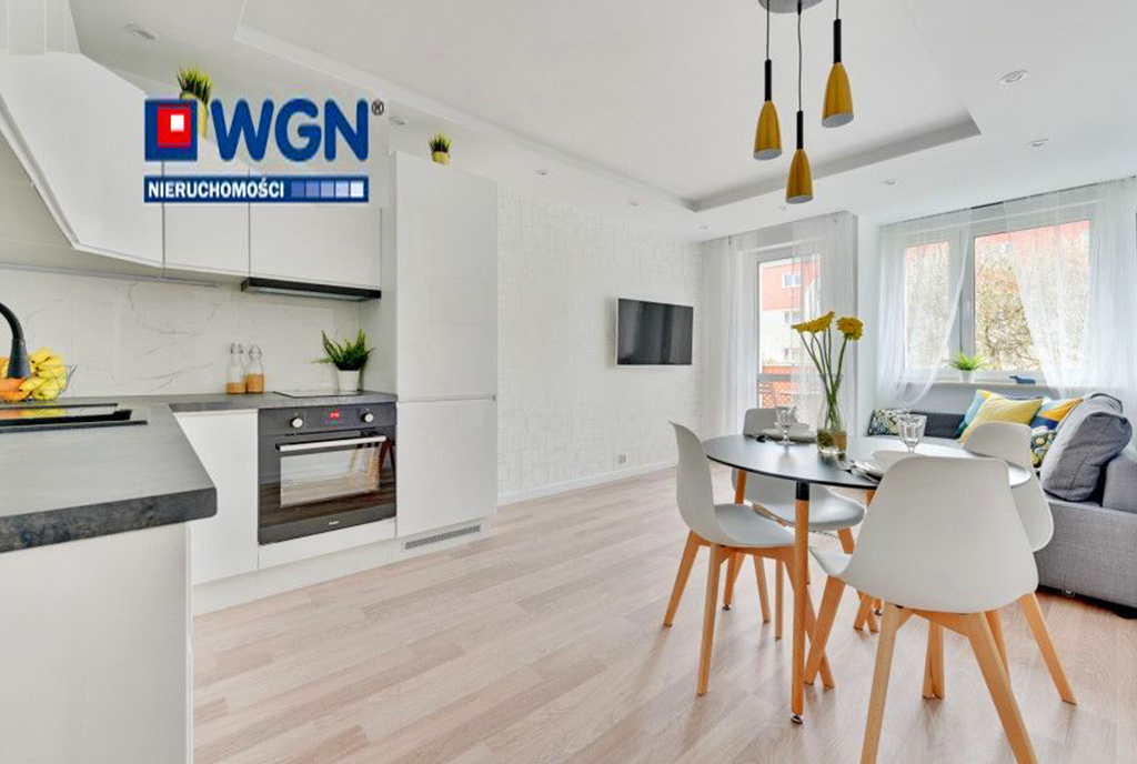 kuchnia w praktycznej zabudowie w ekskluzywnym apartamencie na sprzedaż Gdańsk