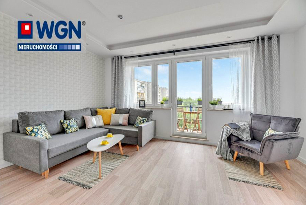 fragment pokoju gościnnego i loggii w luksusowym apartamencie na sprzedaż Gdańsk