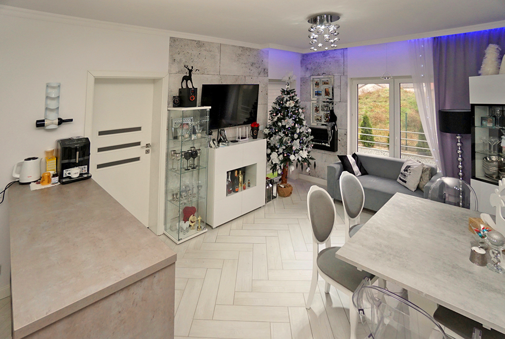 nowoczesny design w salonie luksusowego apartamentu na sprzedaż Konin (okolice)
