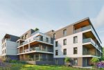 widok od tyłu na apartamentowiec, gdzie znajduje się oferowany na sprzedaż luksusowy apartament Mazury