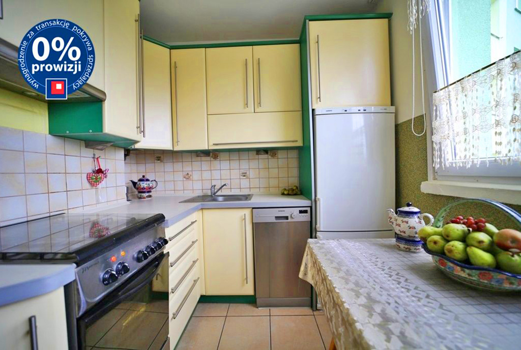 funkcjonalnie zaaranżowana kuchnia w luksusowym apartamencie do sprzedaży