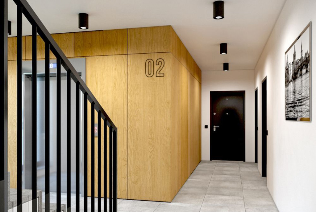 designerska klatka schodowa w apartamentowcu, gdzie znajduje się oferowany na sprzedaż ekskluzywny apartament Myszków