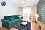 przeciwległa strona salonu w ekskluzywnym apartamencie do sprzedaży Lublin