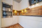 fragment nowoczesnej kuchni w ekskluzywnym apartamencie na wynajem Bolesławiec