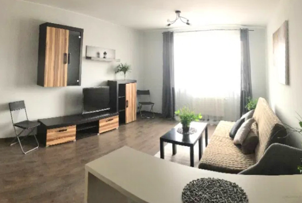 widok na salon w ekskluzywnym apartamencie na wynajem Szczecin
