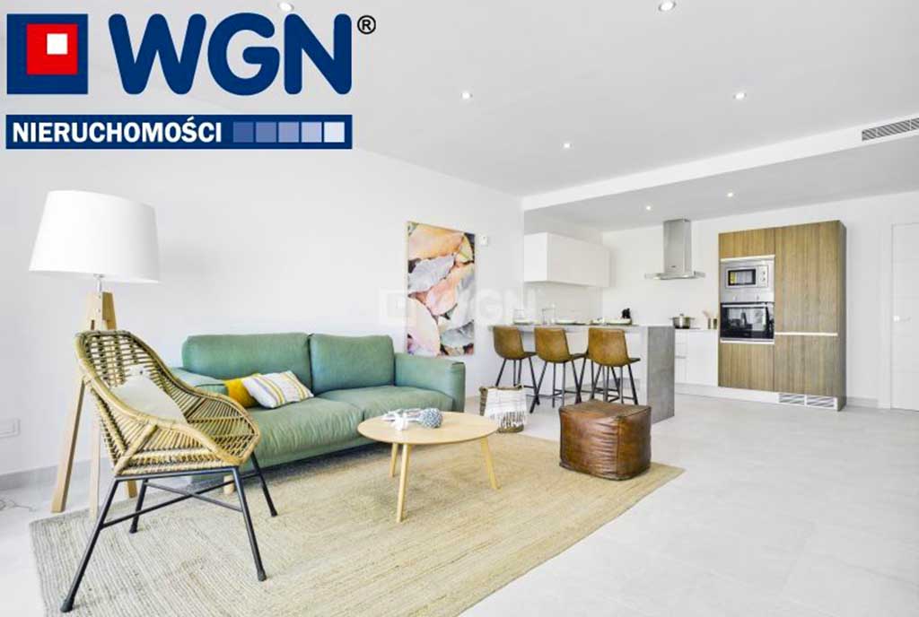 widok z innej perspektywy na salon i aneks kuchenny w luksusowym apartamencie do sprzedaży Pilar De La Horadad (Hiszpania)