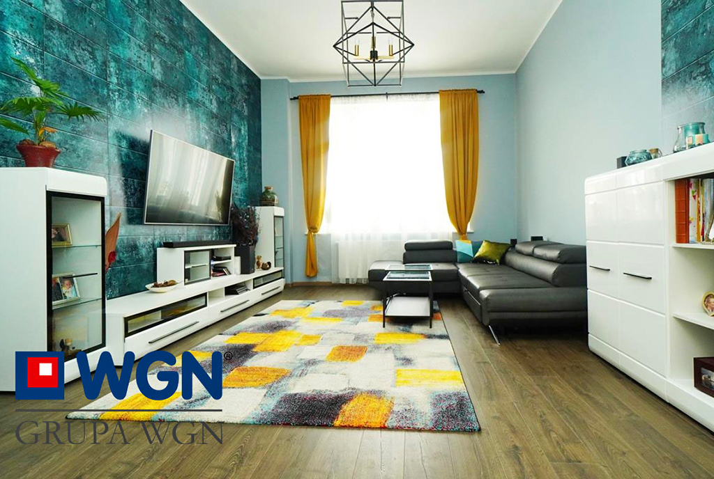 okazały pokój dzienny w luksusowym apartamencie na sprzedaż Elbląg