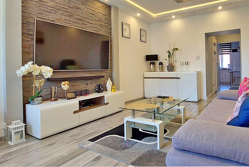 widok na drugą stronę salonu w luksusowym apartamencie na sprzedaż Piotrków Trybunalski