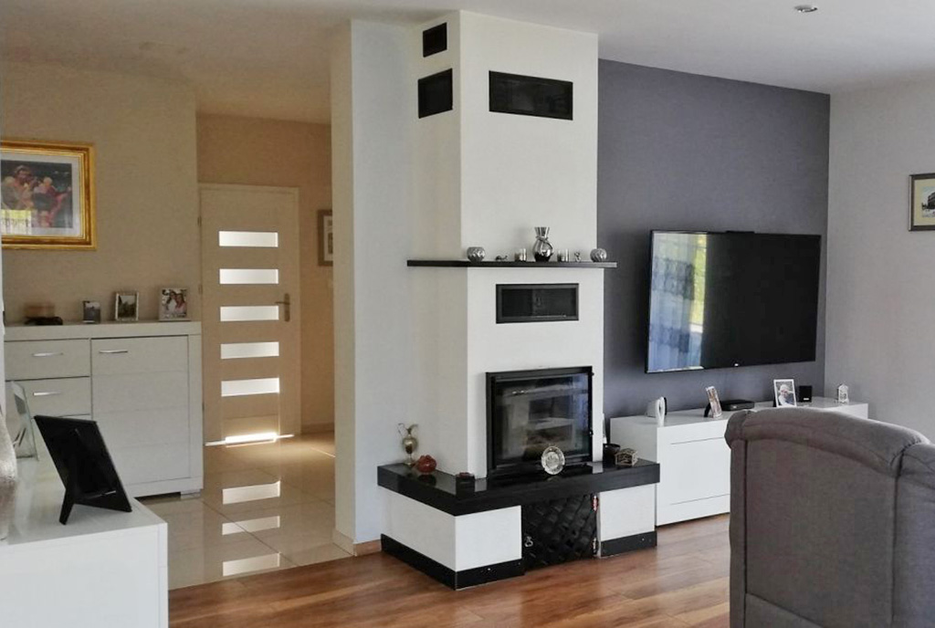 stylowy salon z kominkiem w luksusowej willi na sprzedaż Żagań