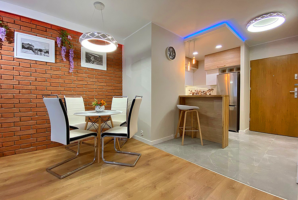 na pierwszym planie jadalnia w luksusowym apartamencie do wynajmu Szczecin