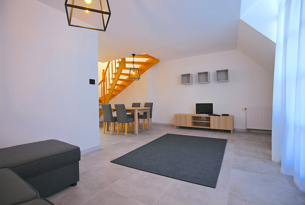 zapierające dech w piersiach rozmachem wnętrze ekskluzywnego apartamentu na wynajem Szczecin