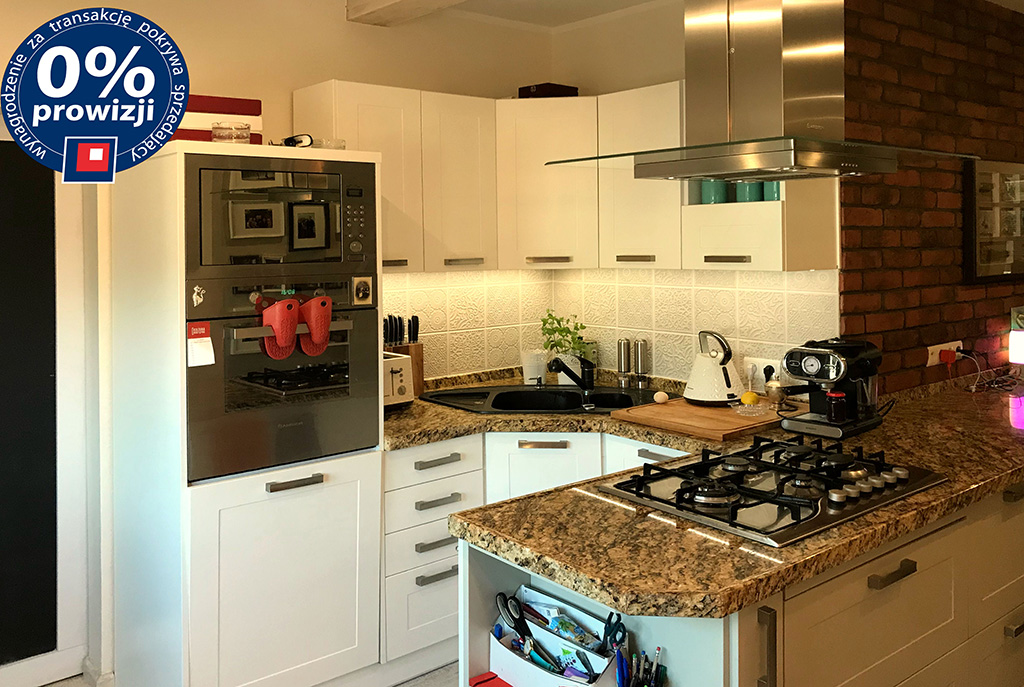 zaprojektowana zgodnie z najnowszymi trendami kuchnia w modnej zabudowie w luksusowej willi do sprzedaży Konin