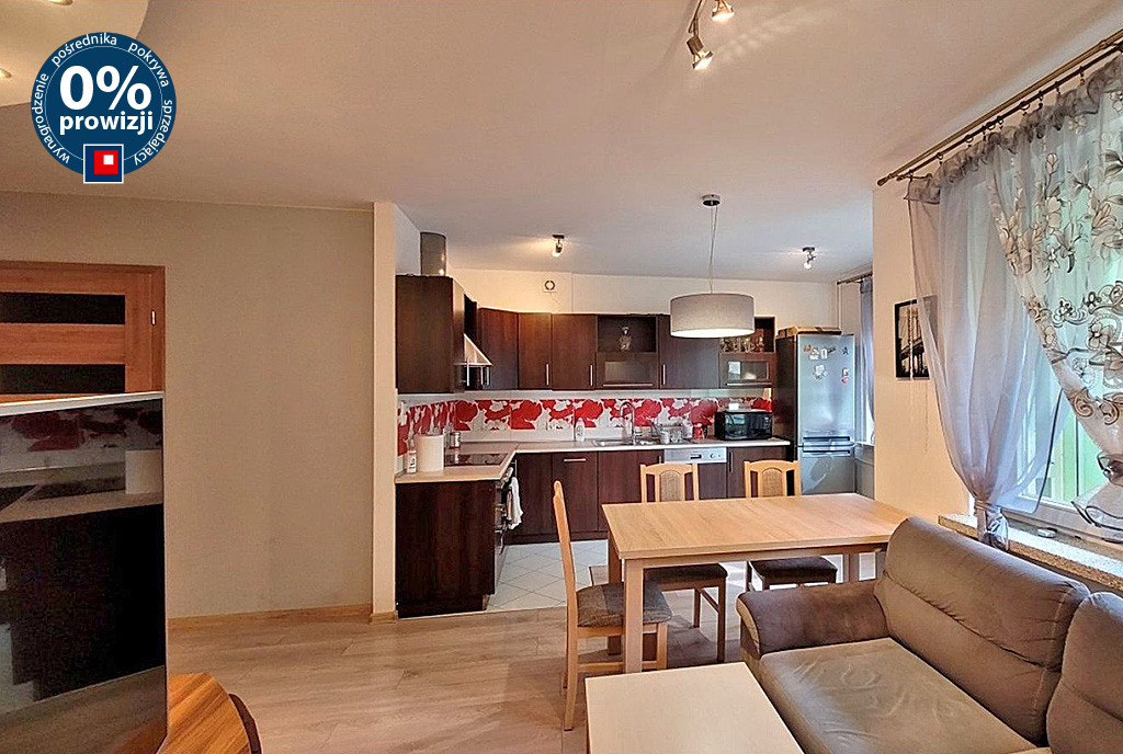 widok z salonu na kuchnię w ekskluzywnym apartamencie do wynajmu Wrocław