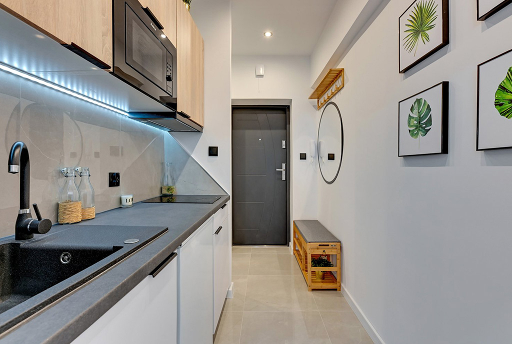 funkcjonalna kuchnia w ekskluzywnym apartamencie na sprzedaż Gdańsk
