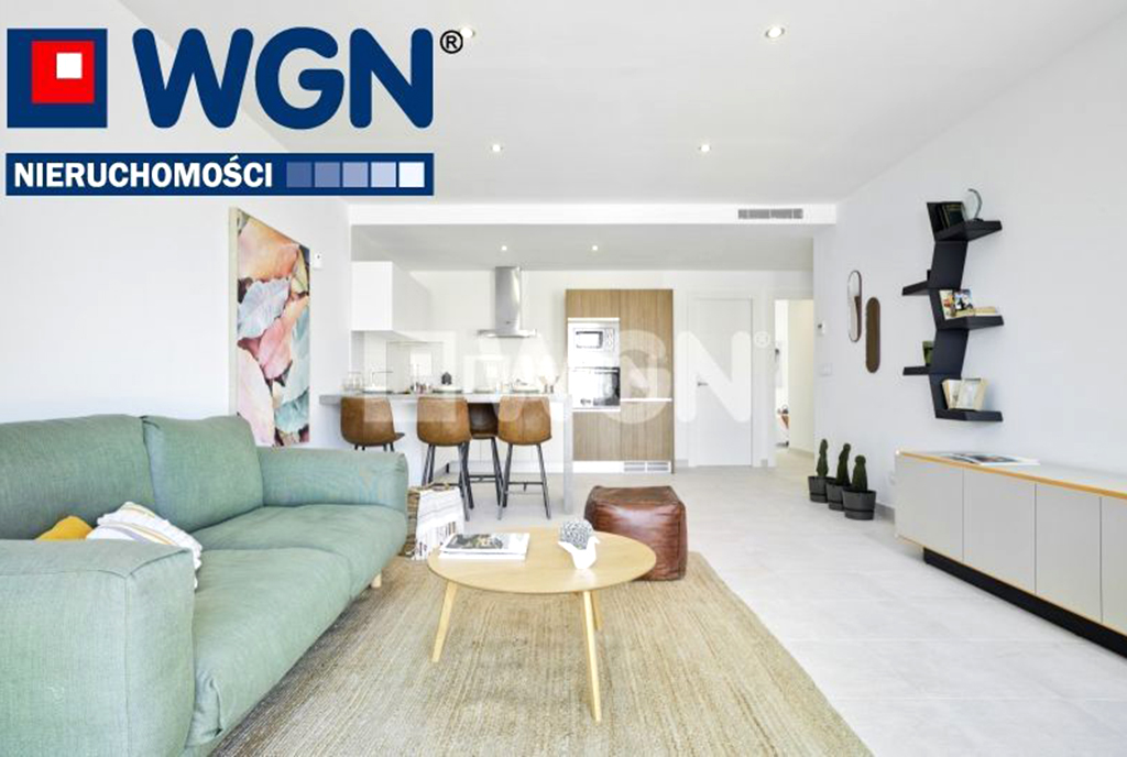 widok na salon, w oddali jadalnia w ekskluzywnym apartamencie do sprzedaży Hiszpania (Pilar de la Horadada, Walencja)